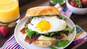Egg, Brie and Arugula Breakfast Sandwich with Strawberry Glazed Bacon