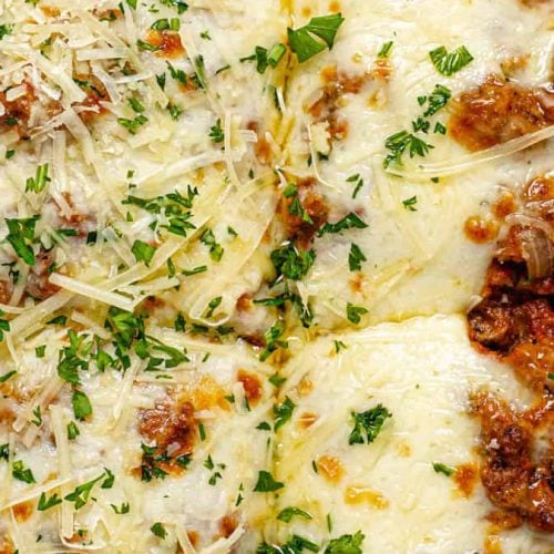 A pan full of baked spaghetti.