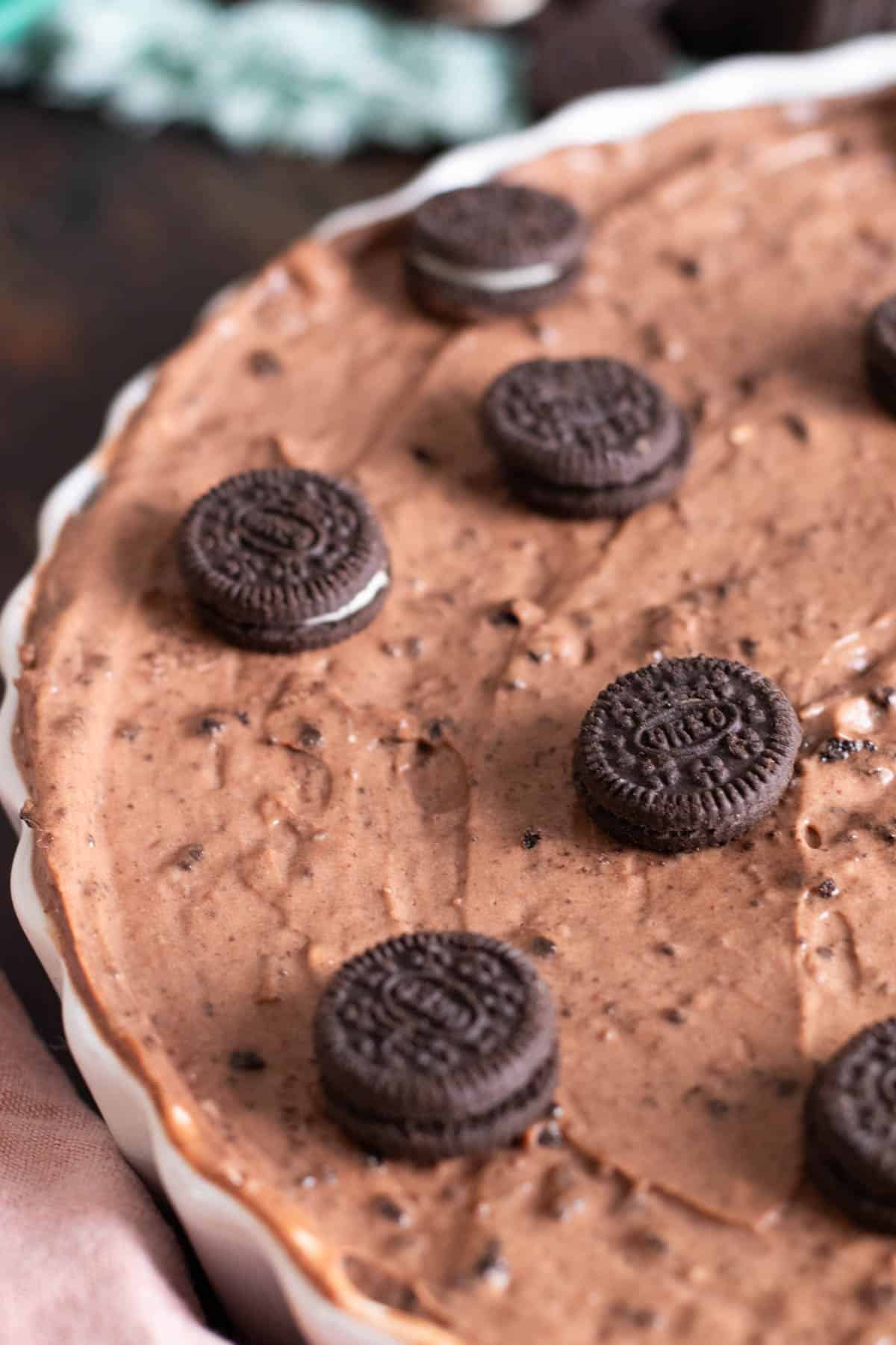 An Oreo dirt pie covered with small Oreos.