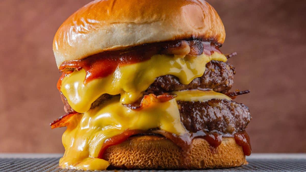 A double burger with cheese.
