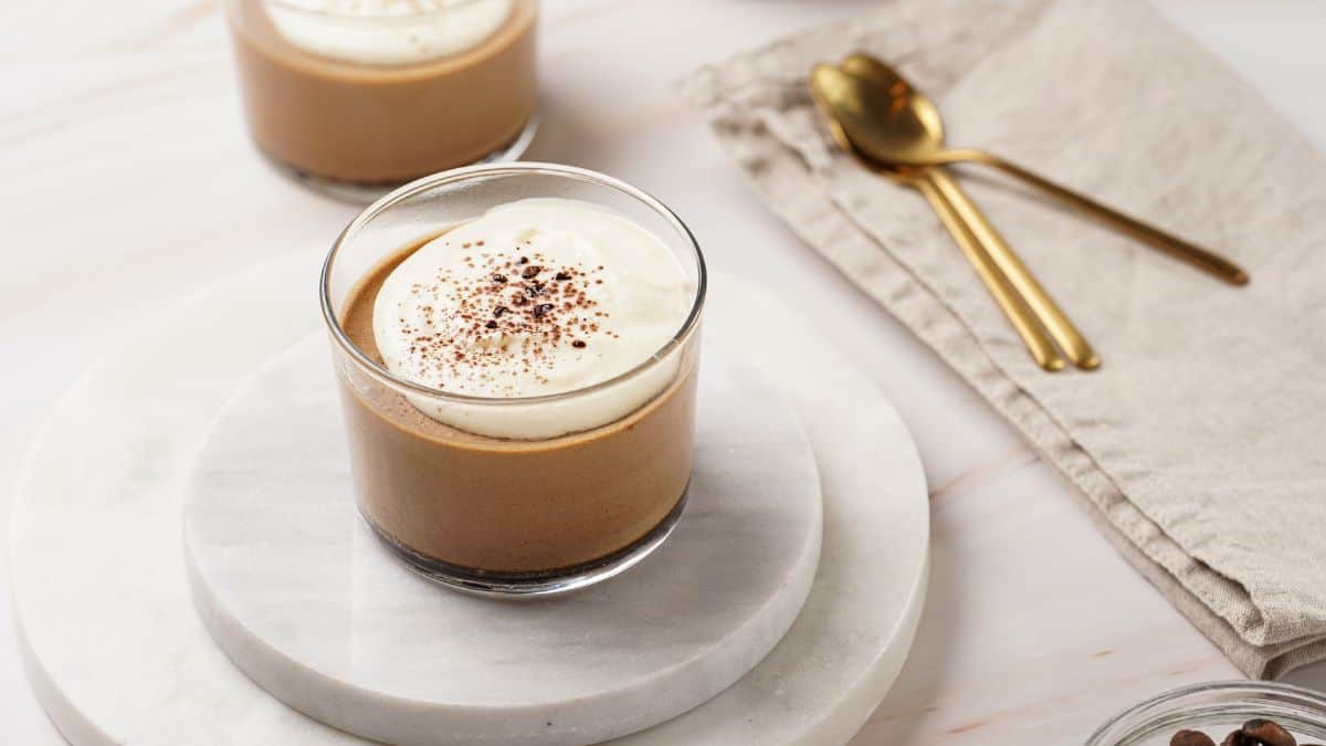 A cup with coffee mousse.