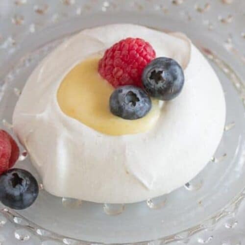 A lemon meringue nest with berries.