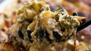 A spoonful of chicken broccoli pasta bake.
