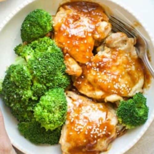 A bowl of broccoli and chicken teriyaki.
