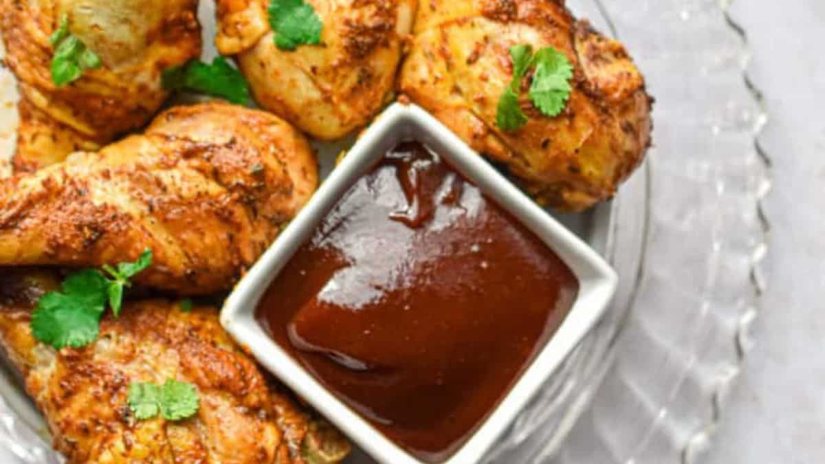 Chicken drumsticks with dipping sauce.
