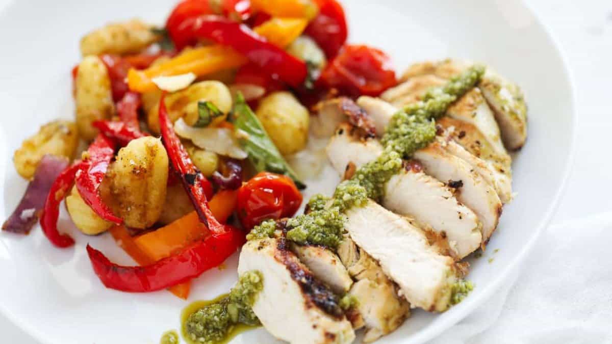 Pesto chicken with a side of salad.