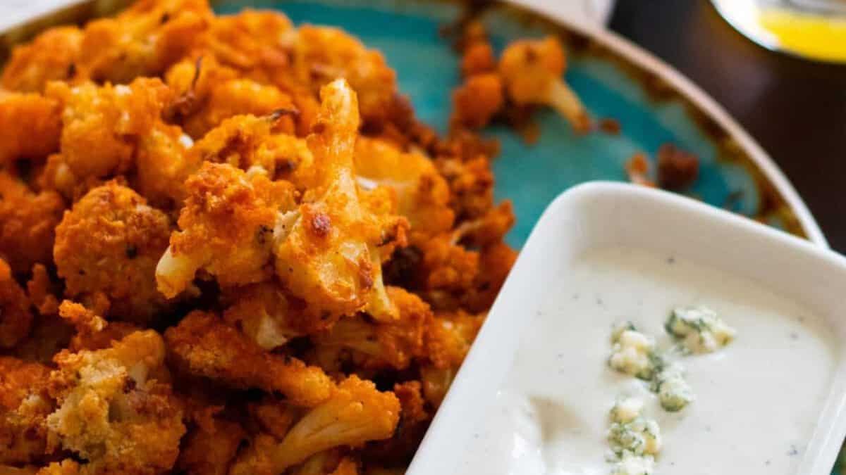 Buffalo cauliflower with blue cheese sauce.