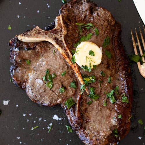 T-bone steak with garlic butter.