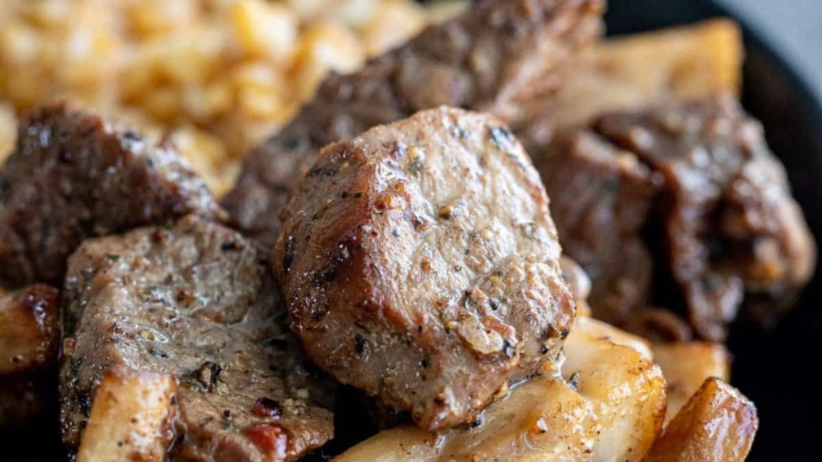 A serving of steak bites and mushrooms.