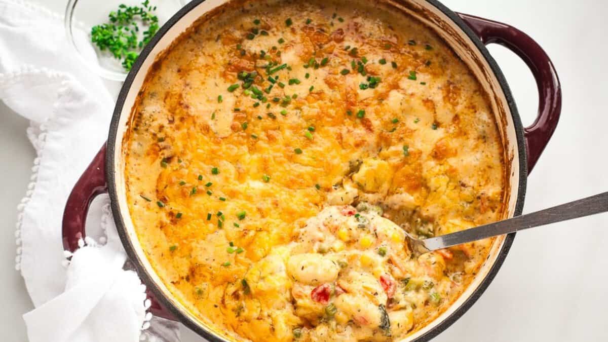 Baked gnocchi with vegetables on a Dutch oven.