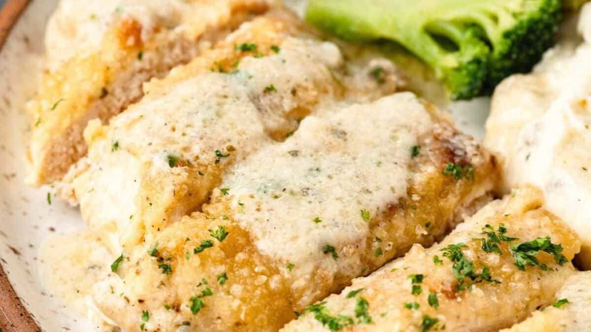 Baked ranch chicken on a plate.