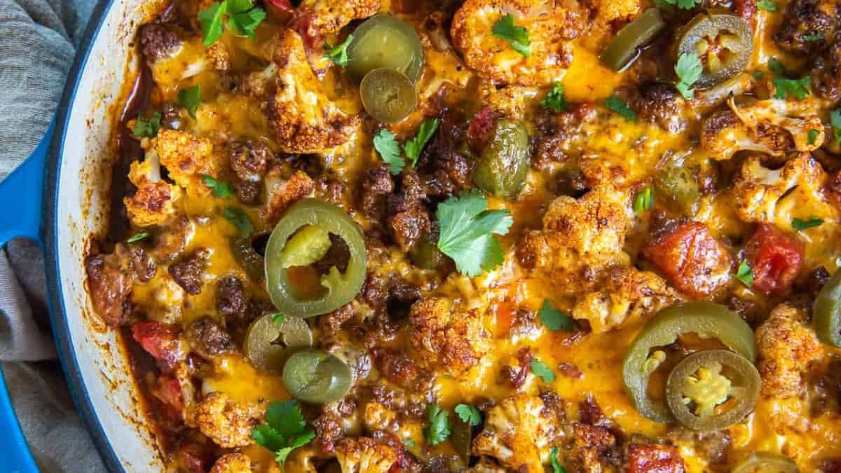 Cauliflower beef taco skillet on a Dutch oven.