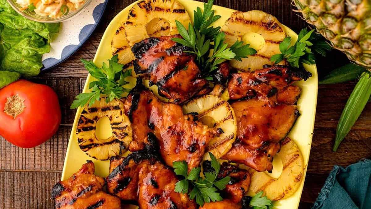 Grilled chicken with pineapple slices.