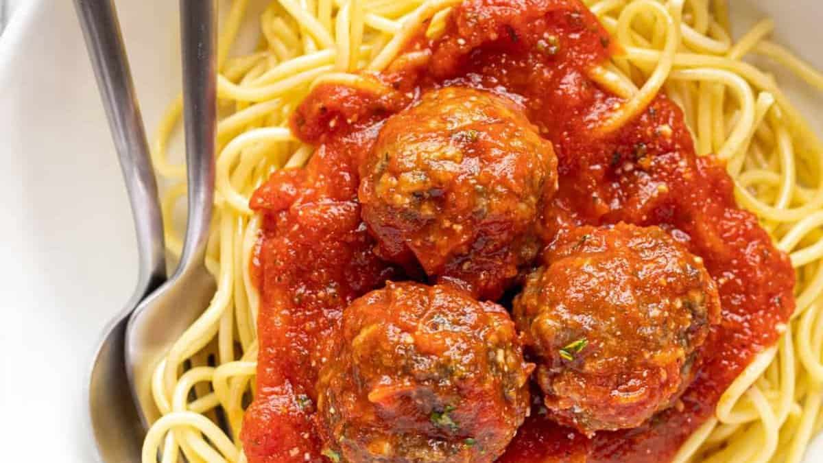 Italian Meatballs served over pasta.