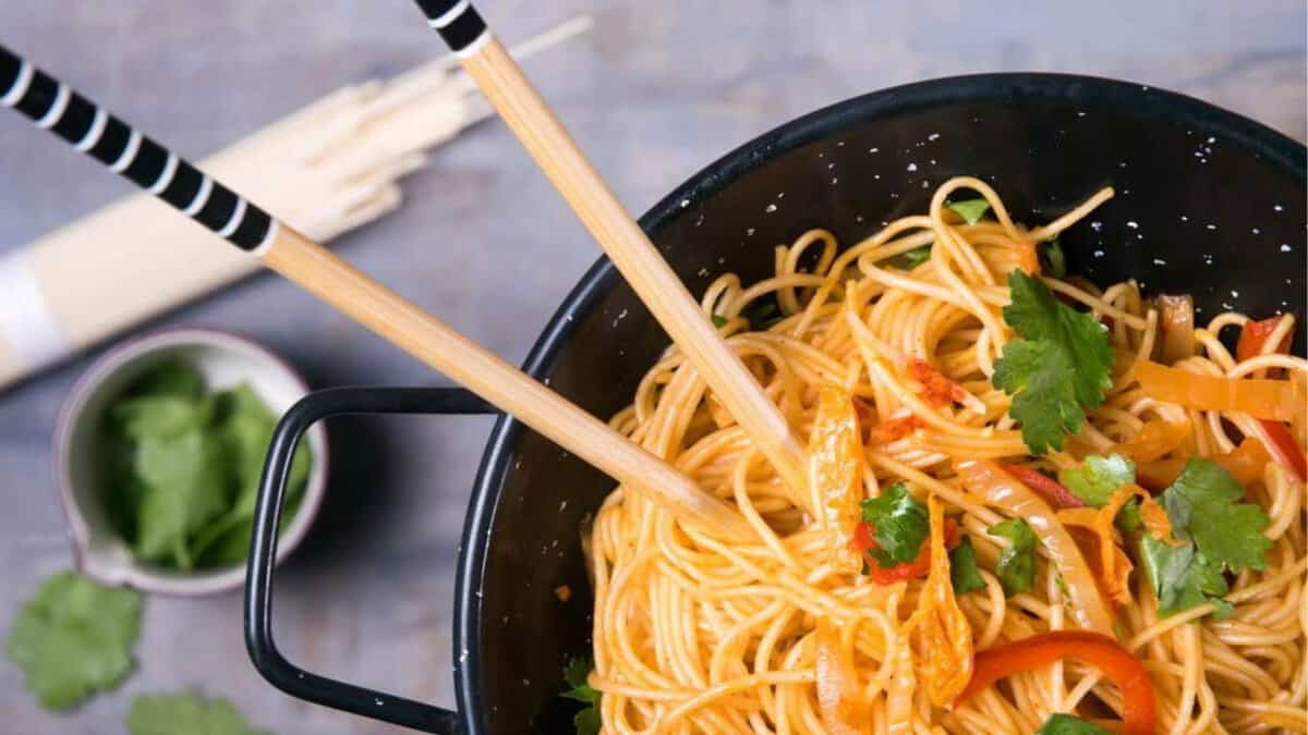 Kimchi Udon Noodle Stir Fry with chopsticks.