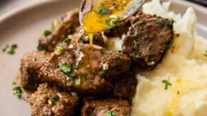 Steak bites with butter.