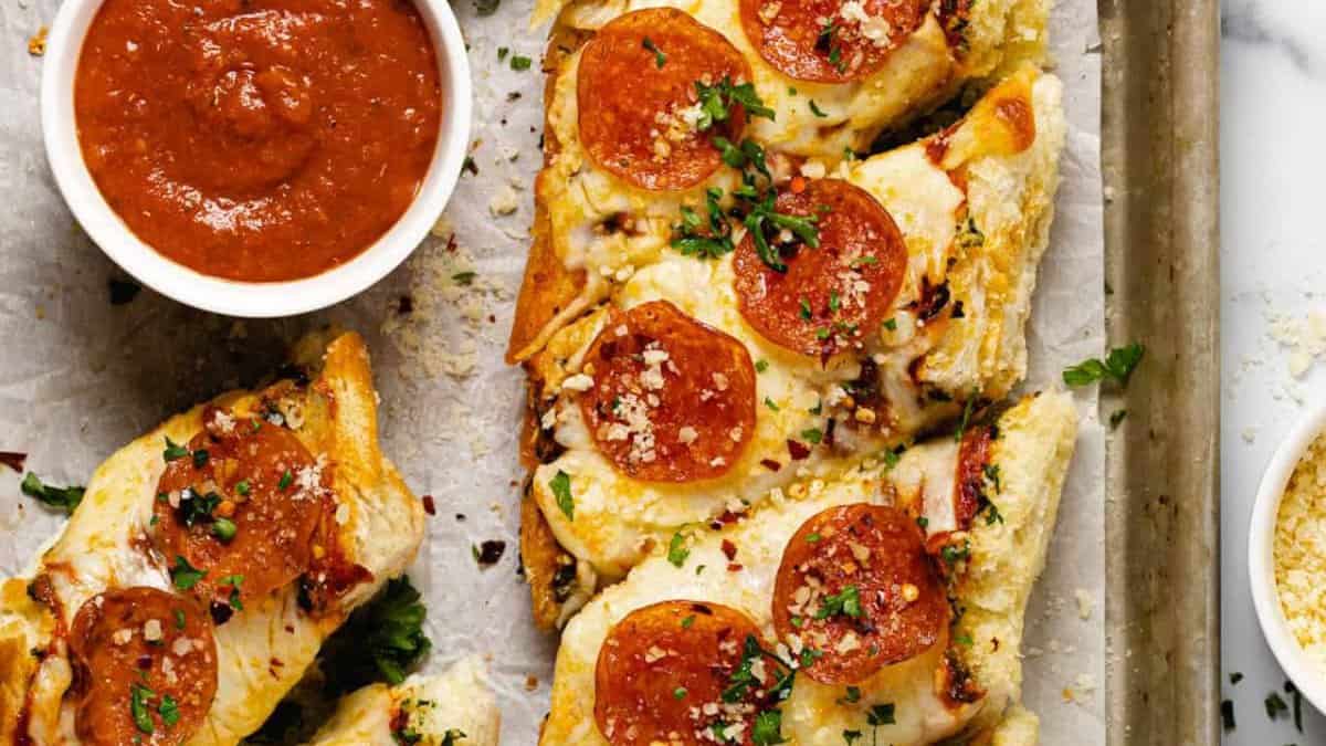 Garlic bread pizza with sauce.