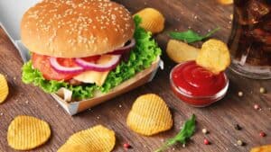 A burger with chips.