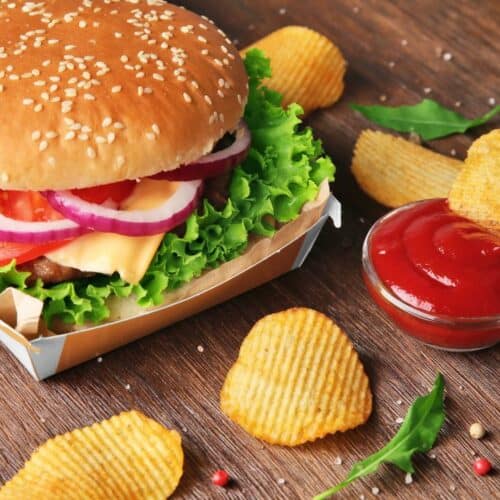 A burger with chips.