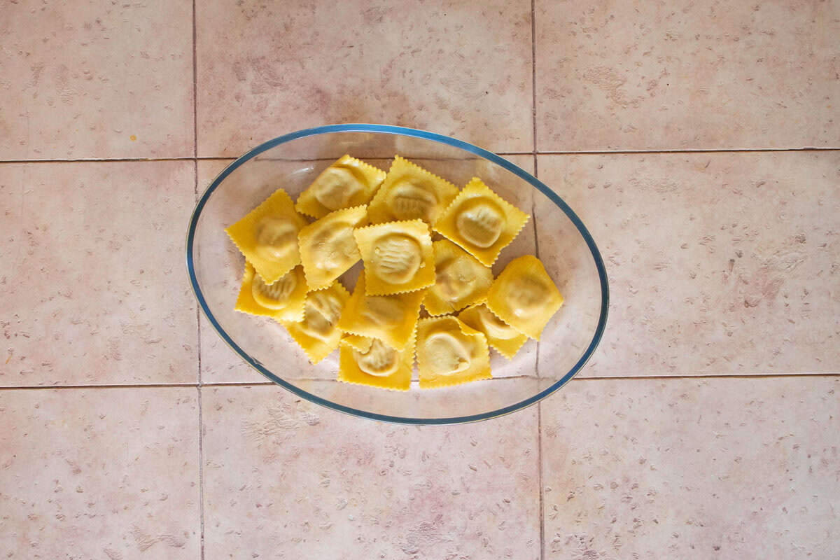 Ravioli in a casserole dish.