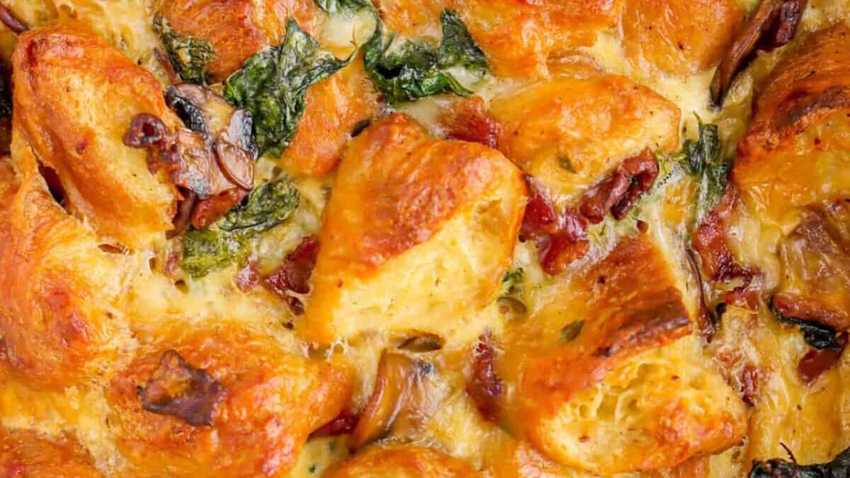 Cheesy Bacon, Kale, Mushroom, and Croissant Breakfast Casserole.