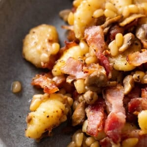 Gnocchi with bacon and mushrooms.