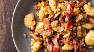 Gnocchi with bacon and mushrooms.