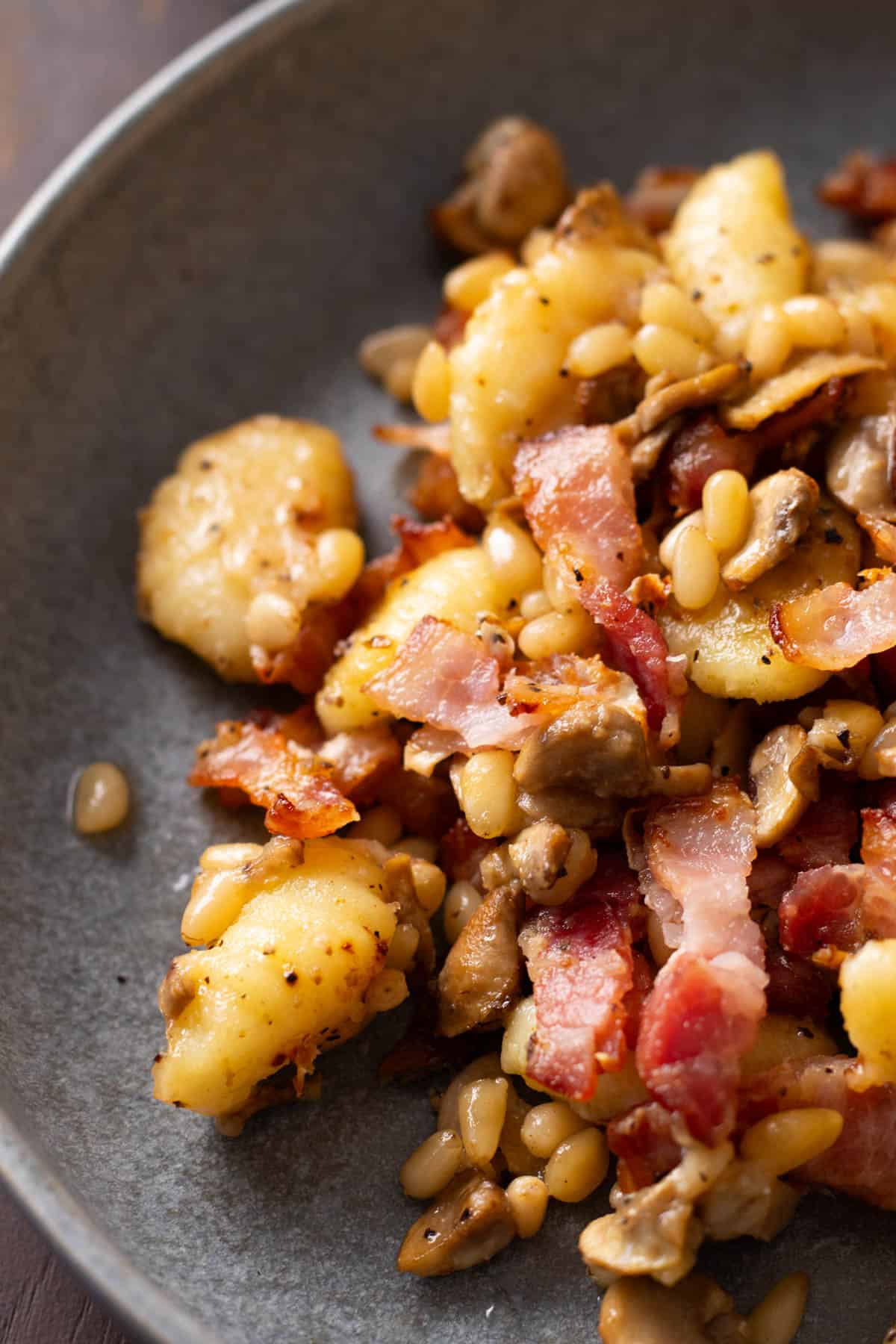 Gnocchi with bacon and mushrooms.