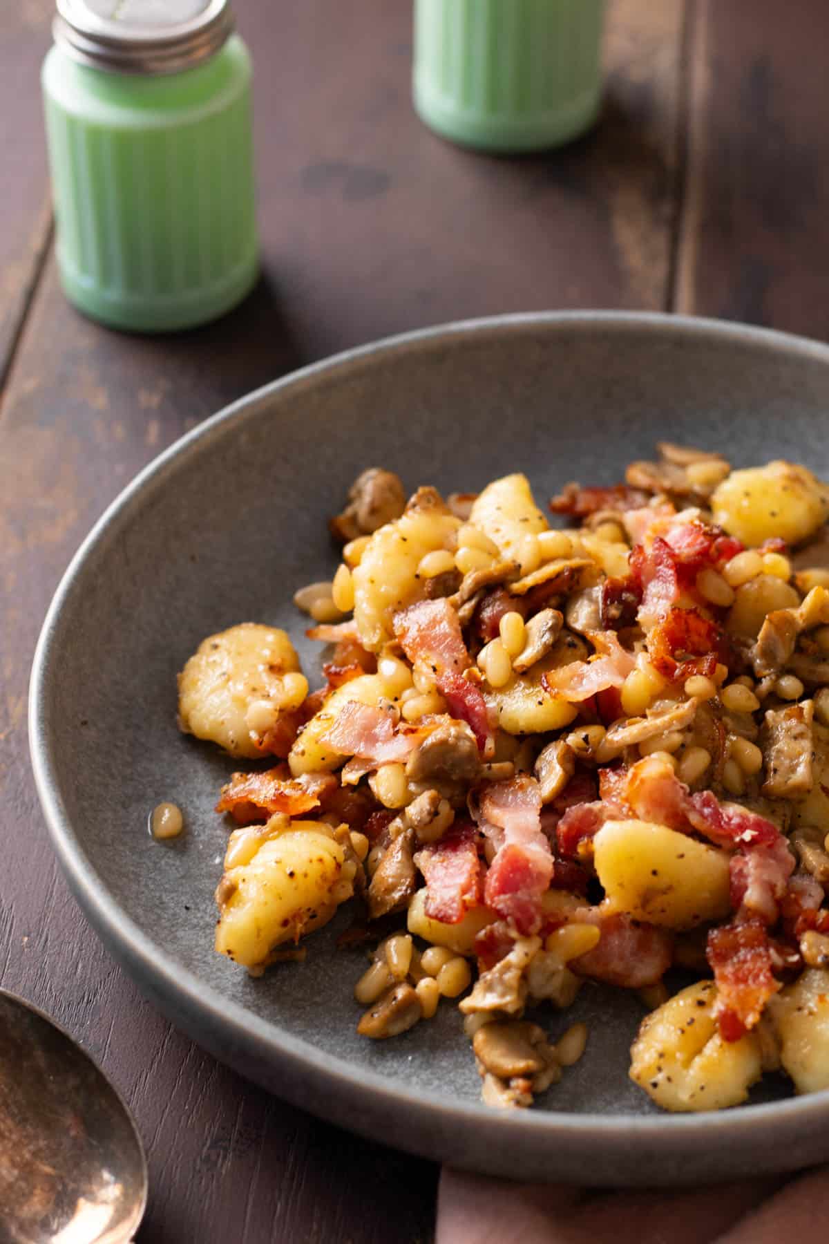 Gnocchi with bacon and mushrooms.