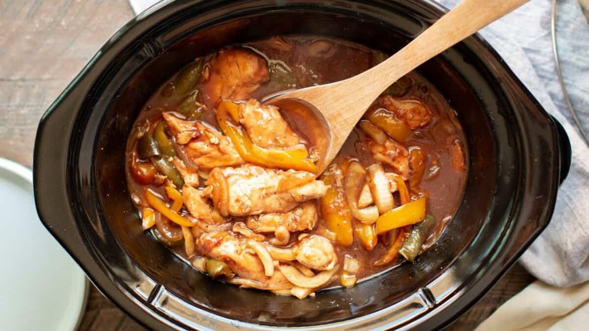 Slow Cooker Barbecue Chicken with Bell Peppers and Onions.