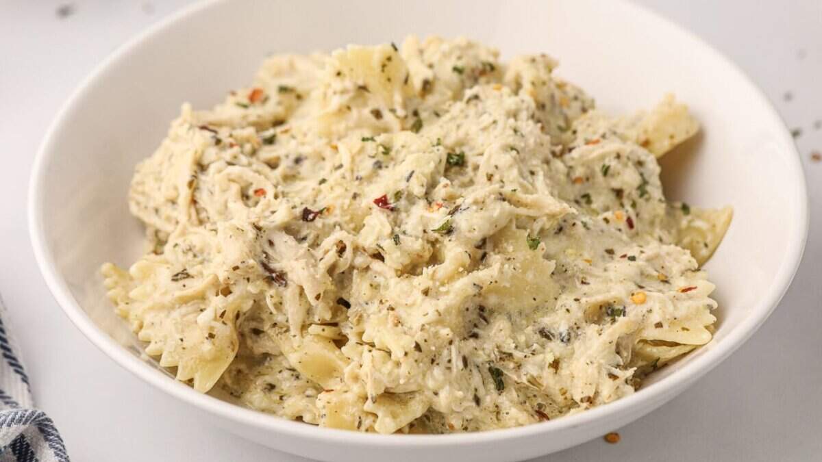 Slow Cooker Creamy Pesto Chicken Pasta.