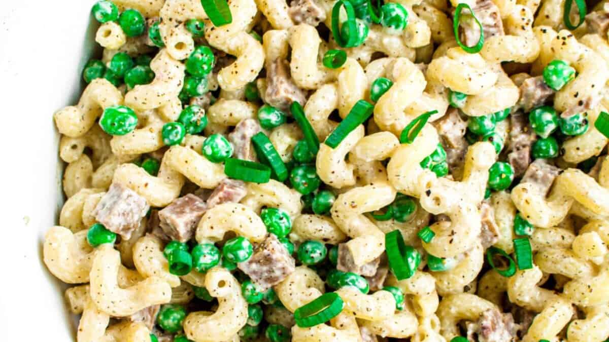 Vegan Creamy Pasta Salad with Peas and Seitan Ham.