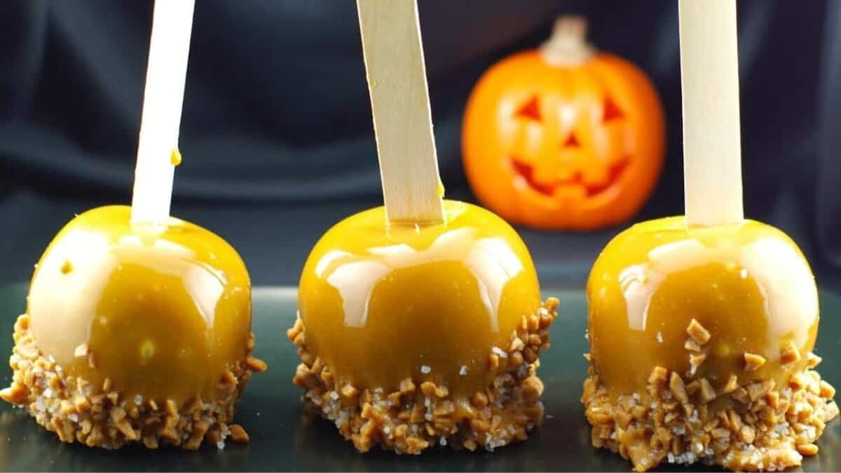 Salted Toffee Halloween Caramel Apples.