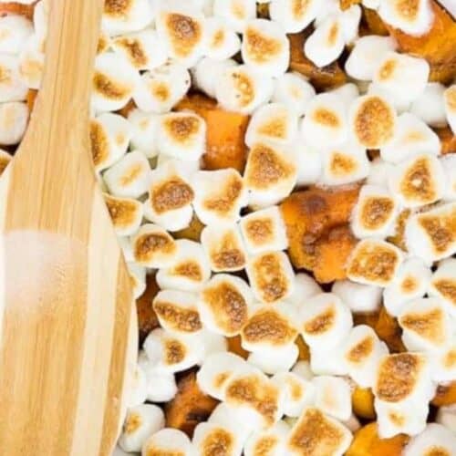 Sweet potato casserole topped with marshmallows.
