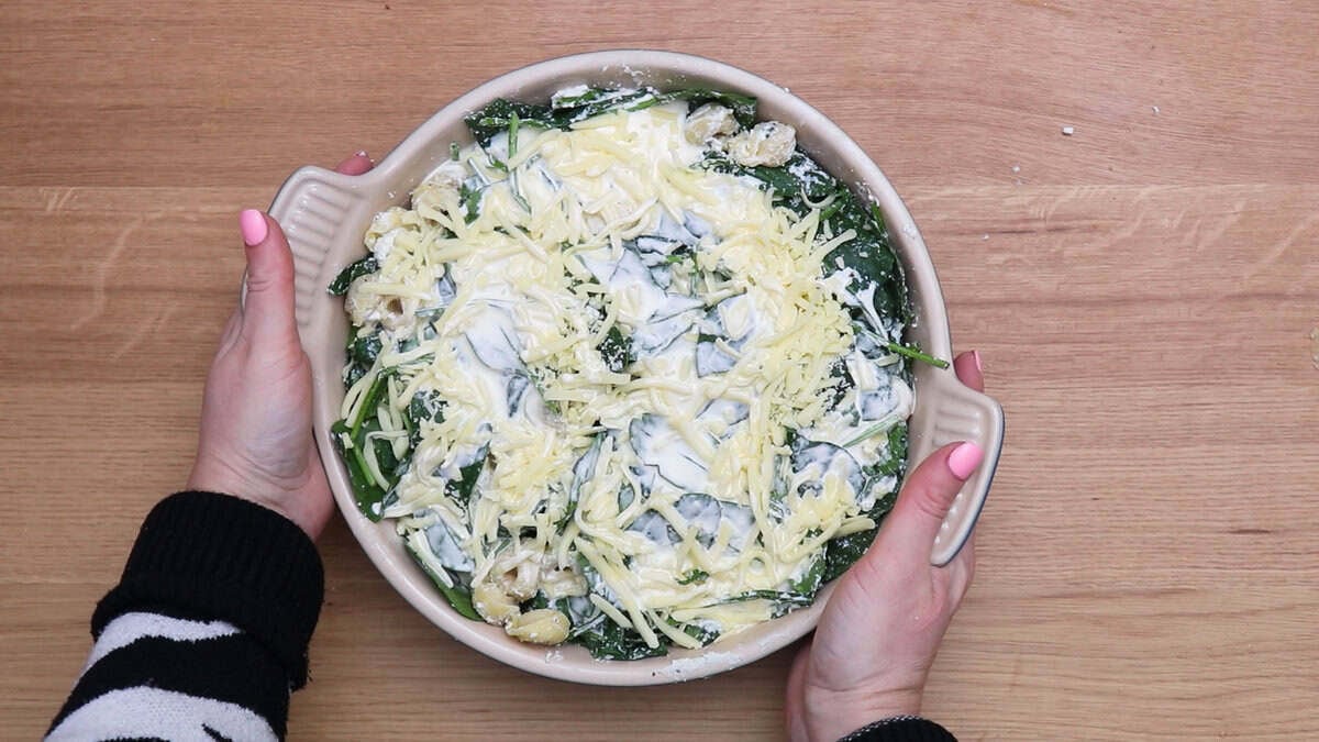 Spinach ricotta tortellini bake before baking.