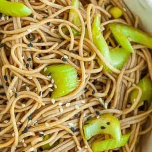 A bowl full of soba noodle salad.