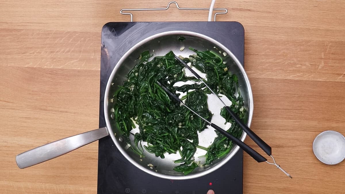Sauteed spinach for spinach lasagna.