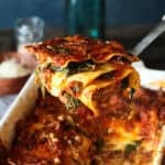 Spinach lasagna with tomato sauce, sun-dried tomatoes and pine nuts.